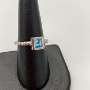 Sterling Silver blue topaz ring. Marked 925. Brand new.